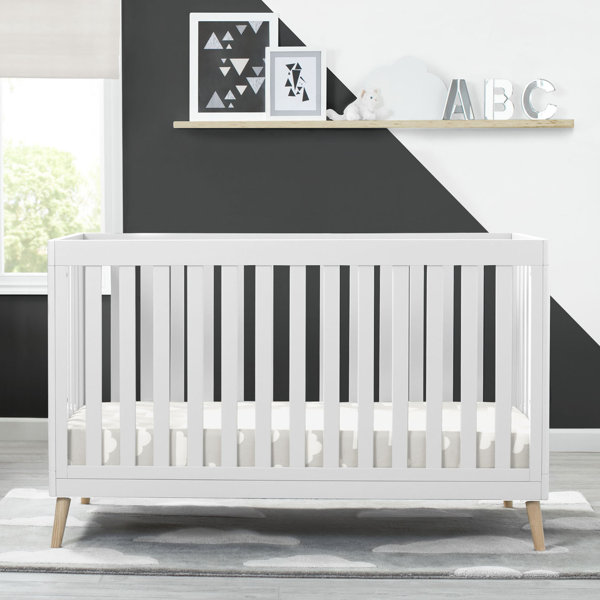 White crib cheap with wood legs